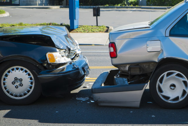 Auto Accident. One Car Rear Ending Another Car. Auto Insurance.