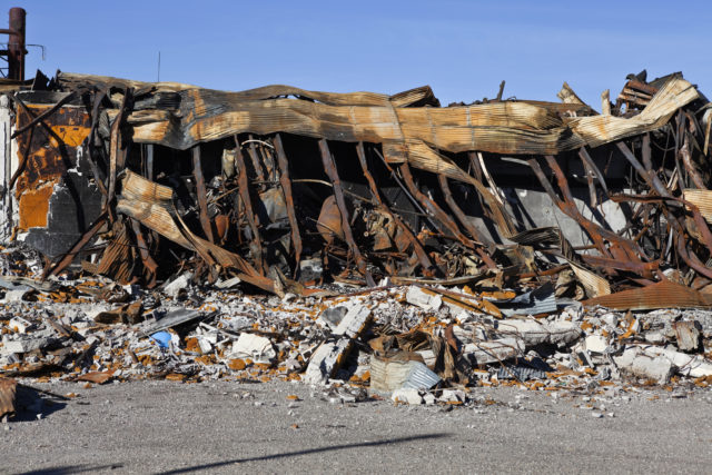 Debris from riots. Burned down building